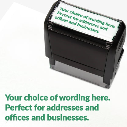 Rectangular self-inking stamper measuring 58mm by 22mm with green ink; featuring the space for personalisation 'Your choice of wording here. Perfect stamper for addresses and offices and businesses.' in a clear, bold font across 3 lines