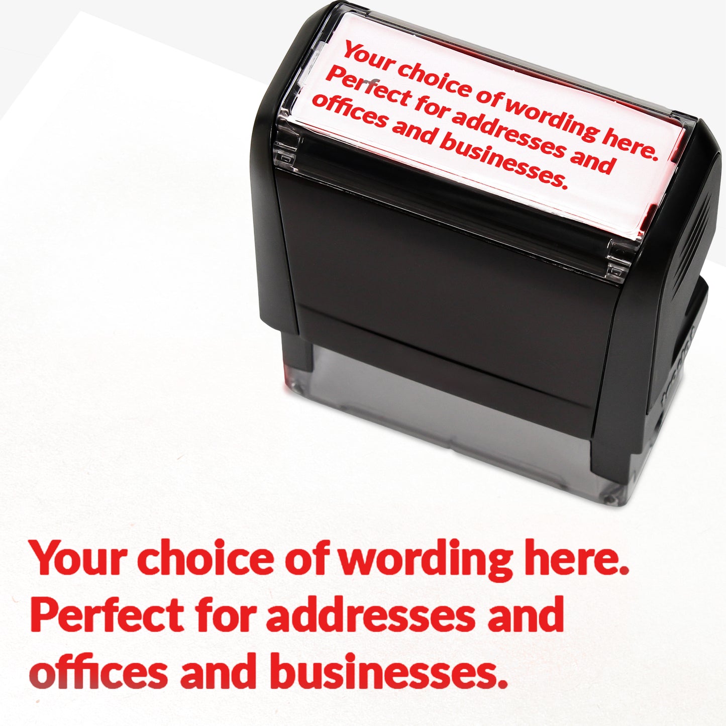 Rectangular self-inking stamper measuring 58mm by 22mm with red ink; featuring the space for personalisation 'Your choice of wording here. Perfect stamper for addresses and offices and businesses.' in a clear, bold font across 3 lines