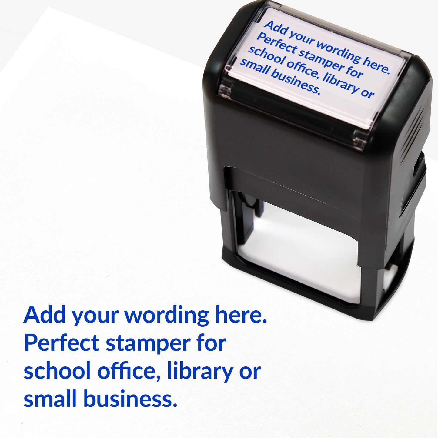 Rectangular self-inking stamper measuring 41mm by 24mm with blue ink; featuring the space for personalisation 'Add your wording here. Perfect stamper for school office, library or small business.' in a clear, bold font across 4 lines