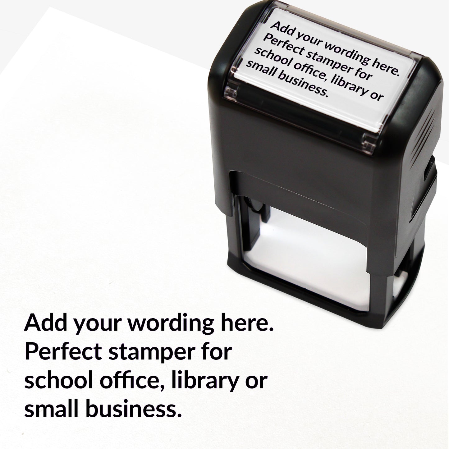 Rectangular self-inking stamper measuring 41mm by 24mm with black ink; featuring the space for personalisation 'Add your wording here. Perfect stamper for school office, library or small business.' in a clear, bold font across 4 lines