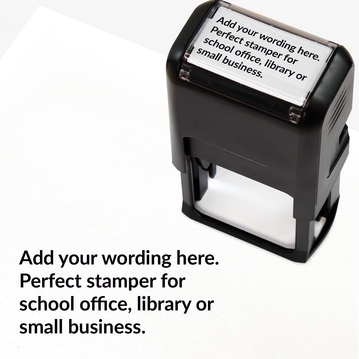 Rectangular self-inking stamper measuring 41mm by 24mm with black ink; featuring the space for personalisation 'Add your wording here. Perfect stamper for school office, library or small business.' in a clear, bold font across 4 lines
