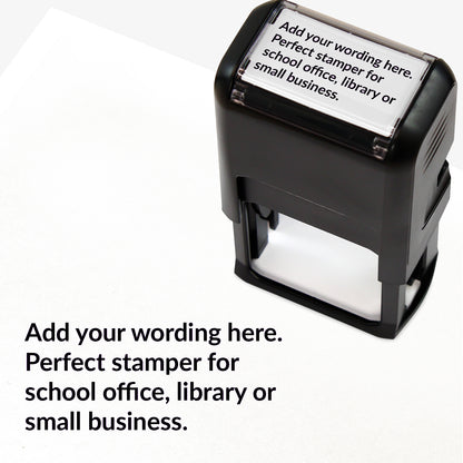 Rectangular self-inking stamper measuring 41mm by 24mm with black ink; featuring the space for personalisation 'Add your wording here. Perfect stamper for school office, library or small business.' in a clear, bold font across 4 lines