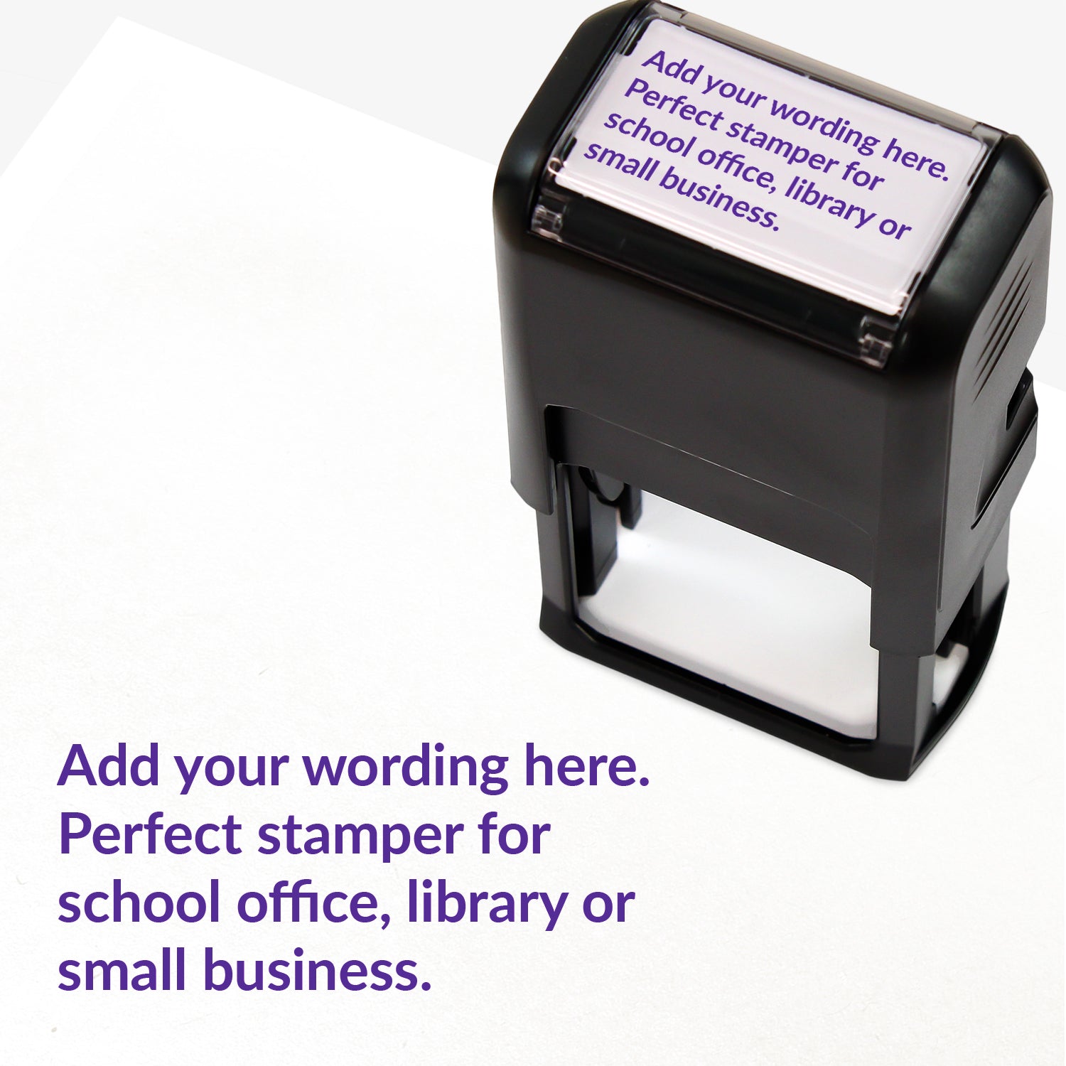 Rectangular self-inking stamper measuring 41mm by 24mm with purple ink; featuring the space for personalisation 'Add your wording here. Perfect stamper for school office, library or small business.' in a clear, bold font across 4 lines