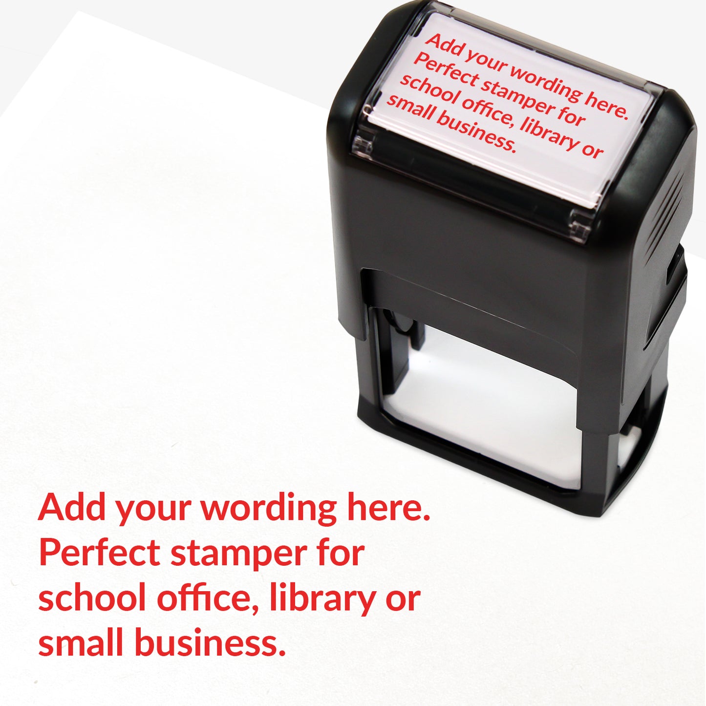 Rectangular self-inking stamper measuring 41mm by 24mm with red ink; featuring the space for personalisation 'Add your wording here. Perfect stamper for school office, library or small business.' in a clear, bold font across 4 lines