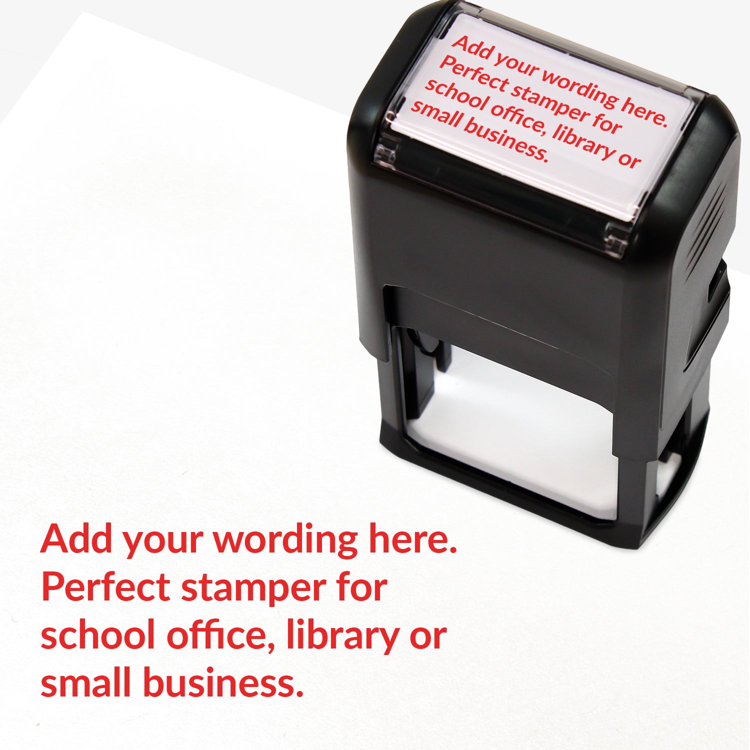Rectangular self-inking stamper measuring 41mm by 24mm with red ink; featuring the space for personalisation 'Add your wording here. Perfect stamper for school office, library or small business.' in a clear, bold font across 4 lines