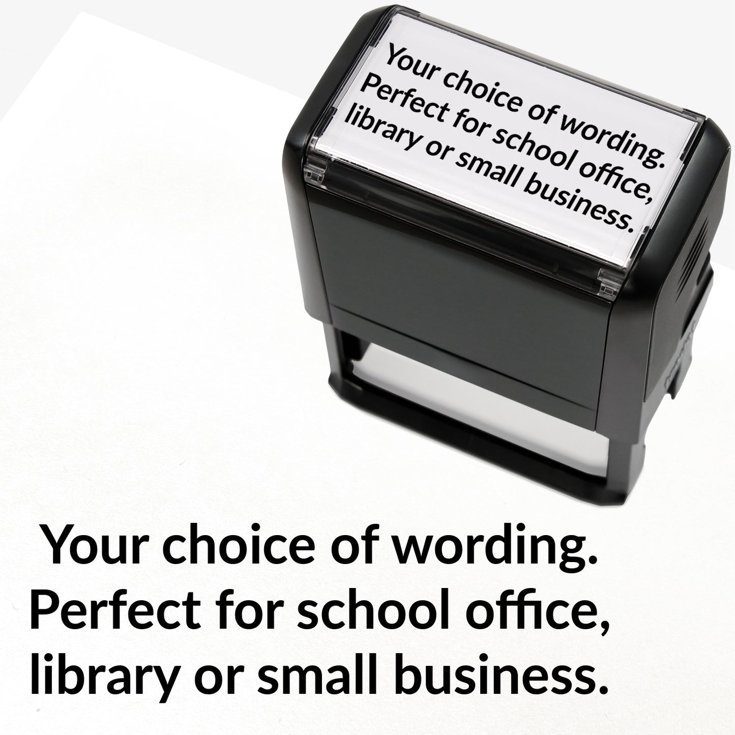 Rectangular self-inking stamper measuring 75mm by 38mm with black ink; featuring the space for personalisation 'Your choice of wording. Perfect for school office, library or small business.' in a clear, bold font across 3 lines