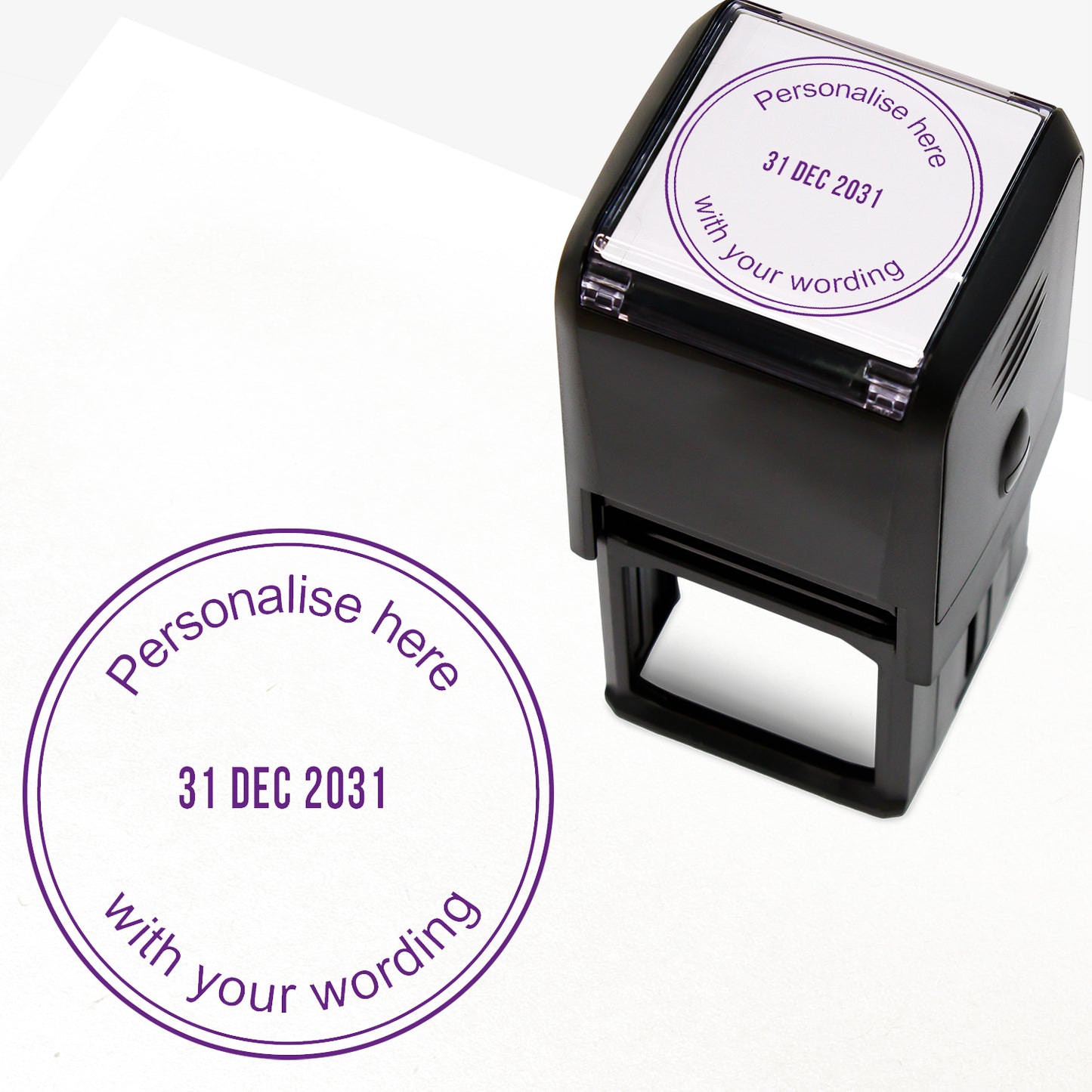 A self-inking stamp with purple ink. The impression within a purple circle includes the date '31 DEC 2031' in the centre, with the purple text 'Personalise here' curved along the top edge and 'with your wording' along the bottom edge of the circle.