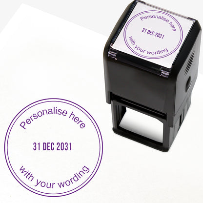 A self-inking stamp with purple ink. The impression within a purple circle includes the date '31 DEC 2031' in the centre, with the purple text 'Personalise here' curved along the top edge and 'with your wording' along the bottom edge of the circle.