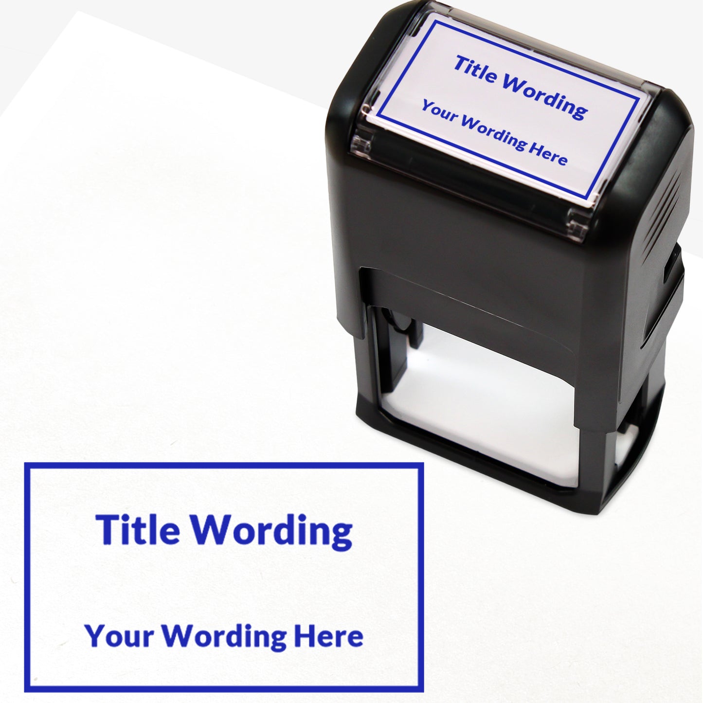 Rectangular self-inking stamper measuring 41mm by 24mm, featuring the phrase 'Title Wording' and 'Your Wording Here' within a text box across 2 lines, in blue ink.
