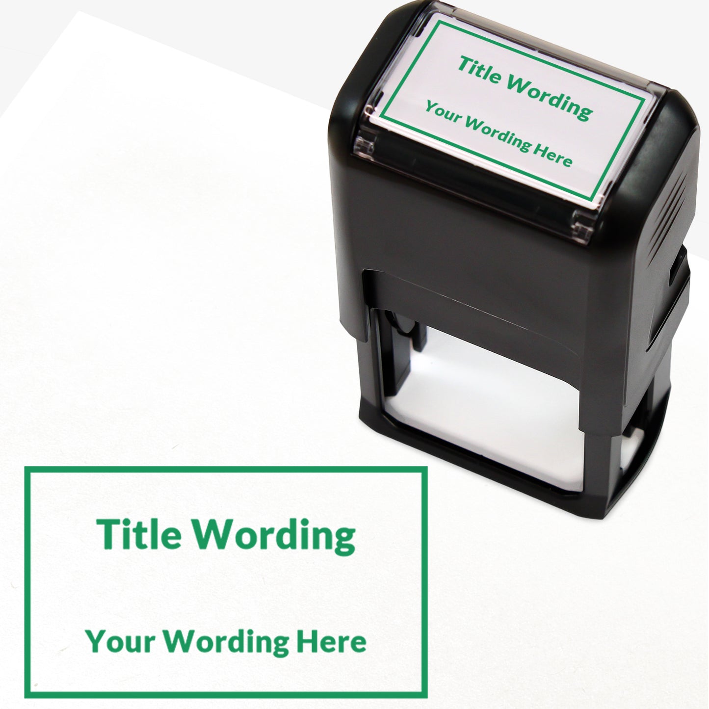 Rectangular self-inking stamper measuring 41mm by 24mm, featuring the phrase 'Title Wording' and 'Your Wording Here' within a text box across 2 lines, in green ink.