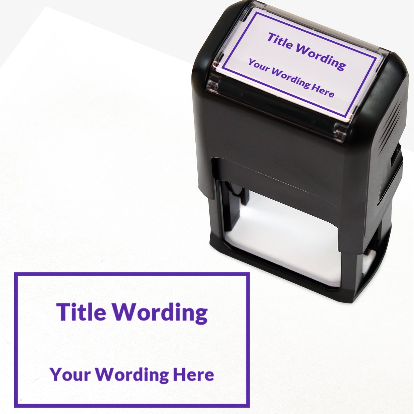 Rectangular self-inking stamper measuring 41mm by 24mm, featuring the phrase 'Title Wording' and 'Your Wording Here' within a text box across 2 lines, in purple ink.