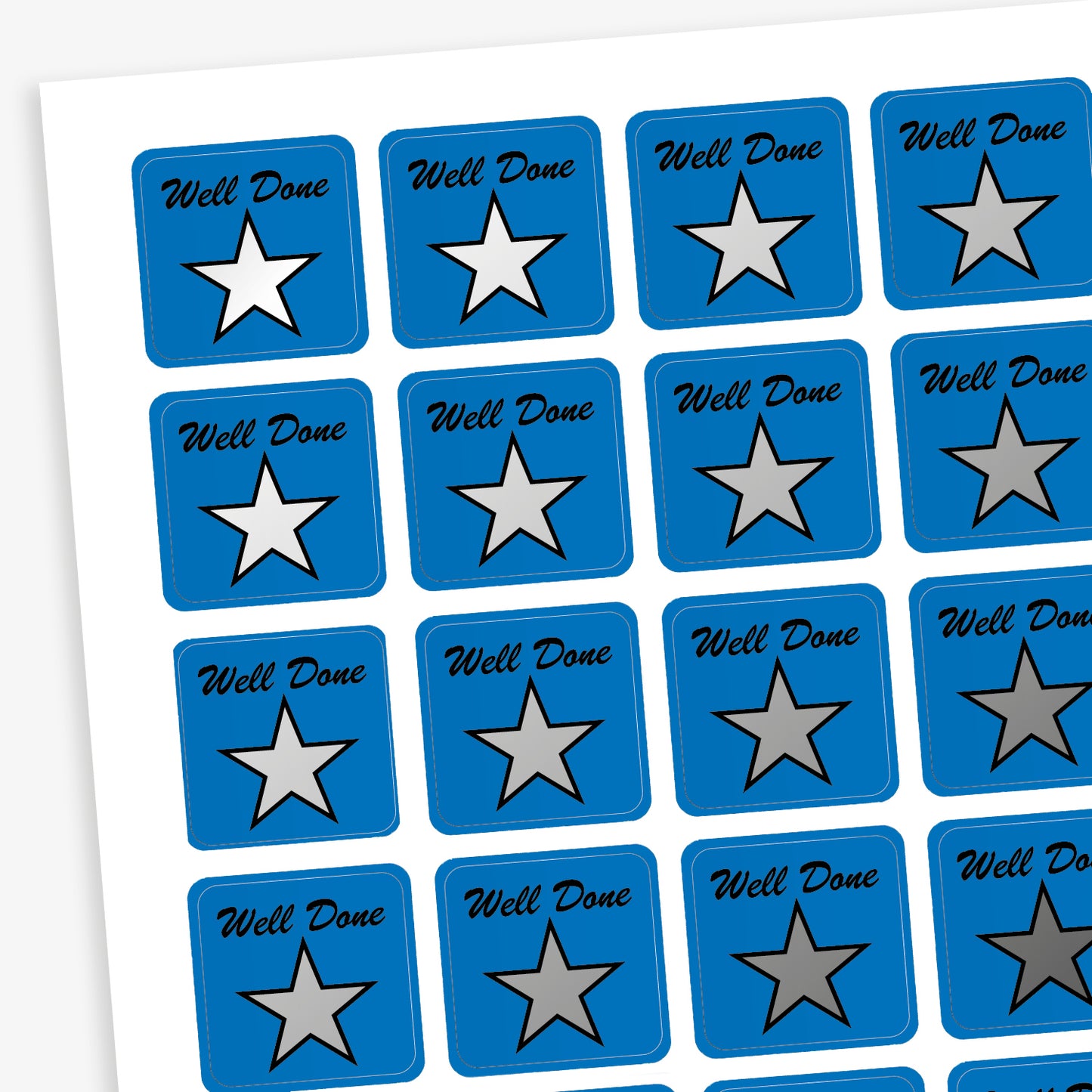 A sheet of 140 square 16mm reward stickers, each featuring the phrase 'Well Done' in black script text above a large silver star set against a vibrant blue background.