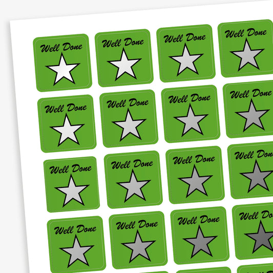 A sheet of 140 square 16mm reward stickers, each featuring the phrase 'Well Done' in black script text above a large silver star set against a vibrant green background.