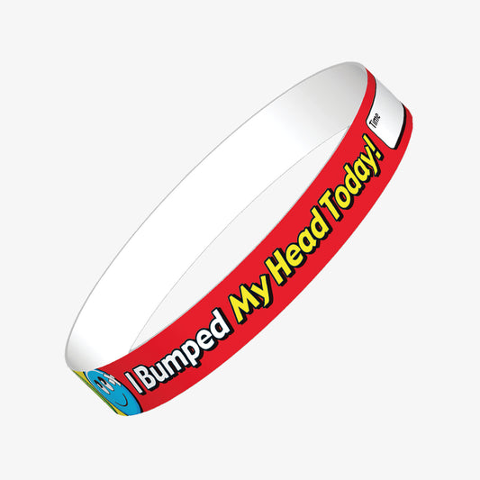 A set of ten red wristbands featuring the phrase 'I bumped my head today' in bold white and yellow letters, with space to write the time of the incident on the wristband; designed to alert staff and parents that a child has experienced a minor head bump during school hours.