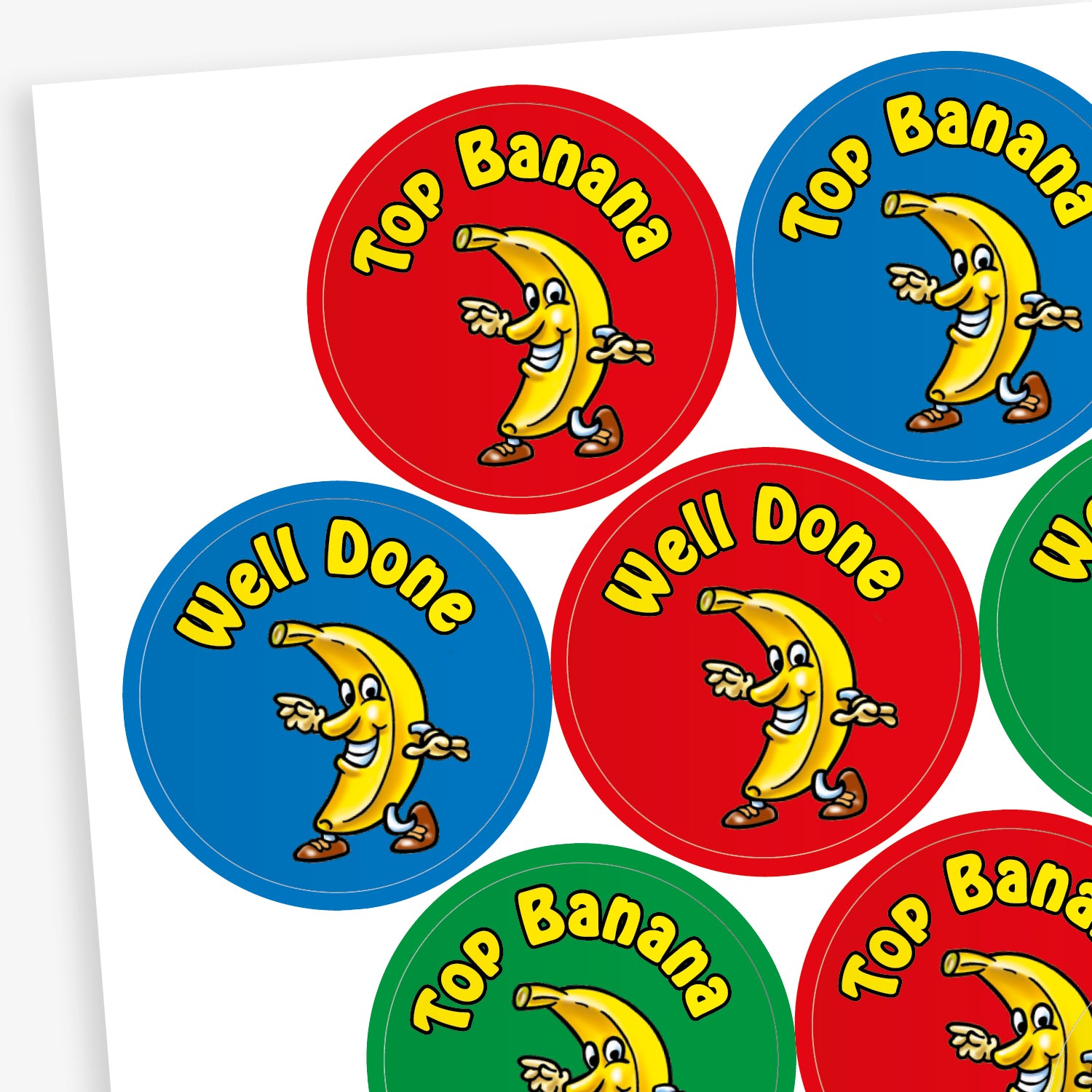 A sheet of 32mm circular stickers with banana scent.  Each featuring a smiling banana who is dancing on brightly coloured backgrounds of red, purple, blue and green.  Phrases include 'Well Done' and 'Top Banana' above the image. 