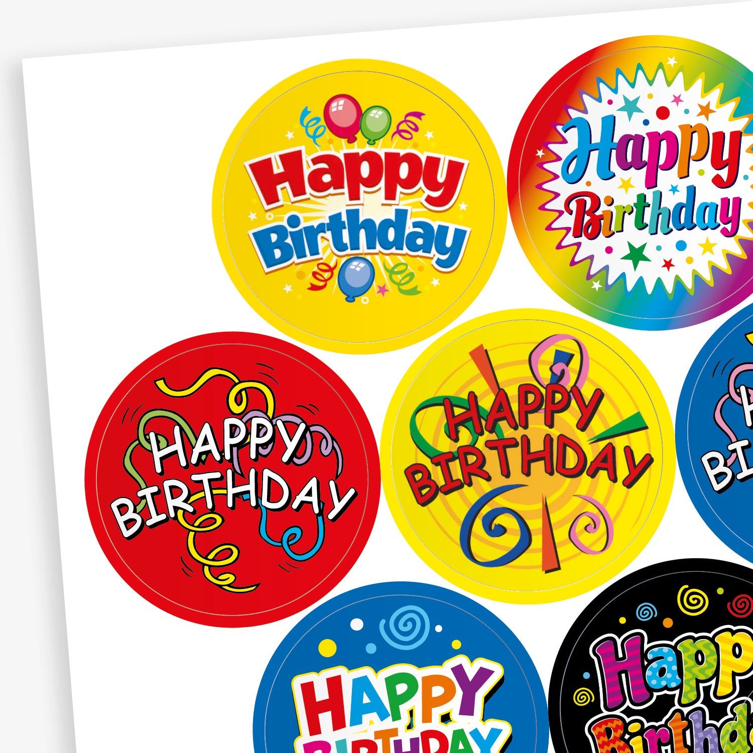 Sheet of strawberry scented round birthday stickers in various bright colours and designs. Each sticker features the phrase 'Happy Birthday' in different playful fonts, with decorative elements such as balloons, stars, swirls, and confetti. Backgrounds include red, yellow, rainbow, blue, and black themes.
