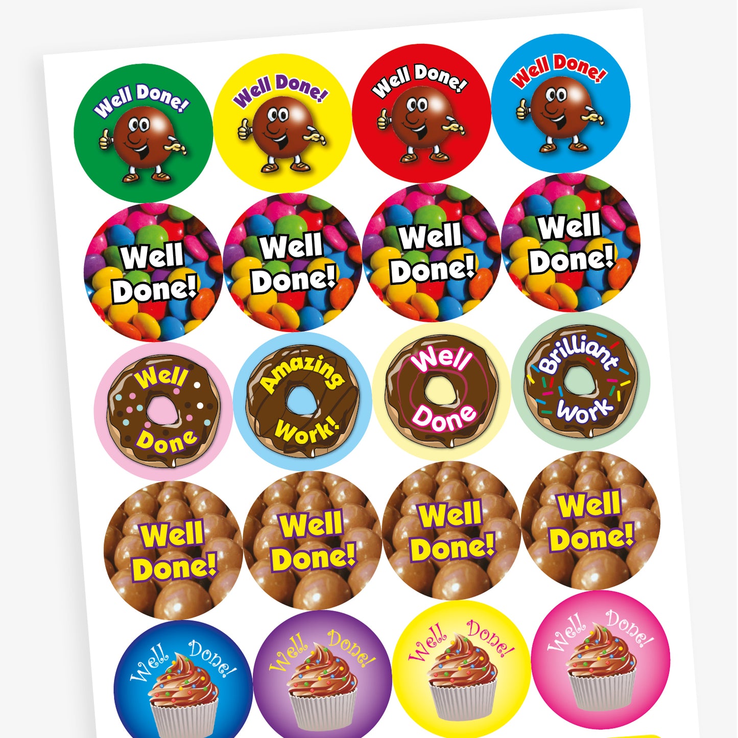 Sheet of 32mm chocolate-scented reward stickers featuring assorted colourful designs, including smiling chocolate characters, cupcakes, doughnuts, and sweets, each displaying motivational phrases like 'Well Done' and 'Amazing Work'; designed for rewarding pupils' achievements.