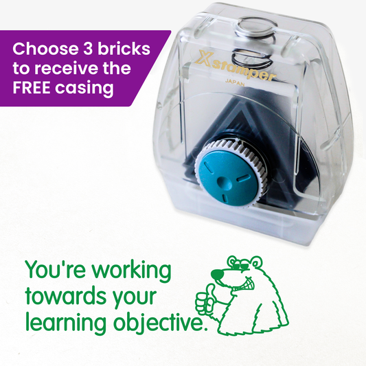 One Twist N Stamp brick in green ink.  An polar bear wearing sunglasses alongside the phrase 'You're working towards your learning objective' 
