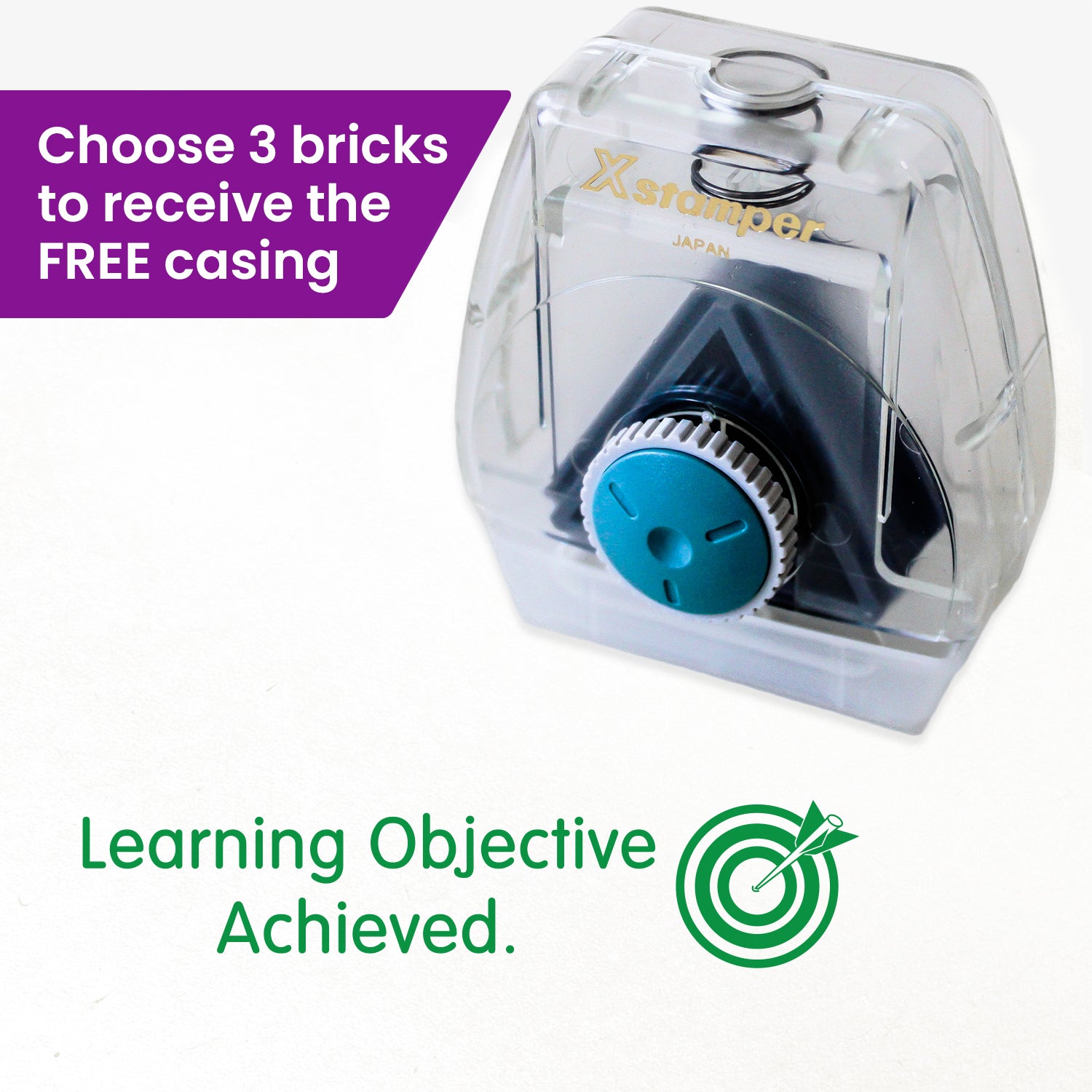 One Twist N Stamp brick in green ink.  An arrow hitting a bullseye, alongside the phrase 'Learning Objective Achieved' 
