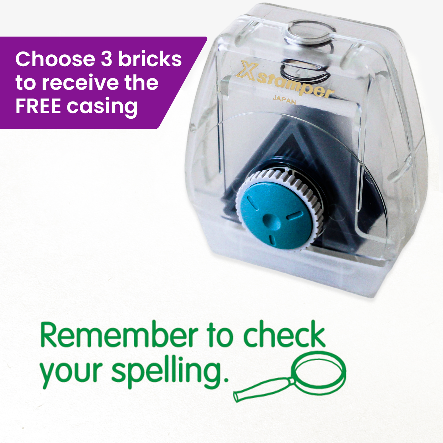 One Twist N Stamp brick in green ink saying 'Remember to check your spelling' with a magnifying glass to the bottom right hand side